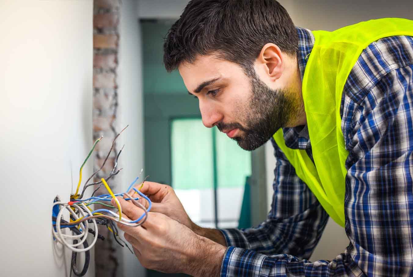 Electrician Upgrading Wiring to Increase House Value