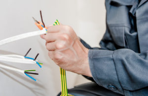 Electrician Performing Electrical Maintenance